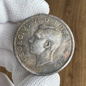 Munt 1 dollar Canada munt 1948 REPLICA verzilverd
