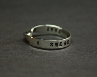 4mm. "And in that moment, I swear we were infinite" from "The Perks of Being a Wallflower” by Stephen Chbosky is stamped on  mobius ring.