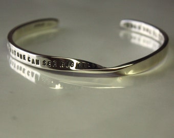 PERSONALIZED Mobius (with 90 characters or less) cuff. Text hand stamped on solid sterling silver strip 4mm/5mm x 2mm. Great Gift Adjustable