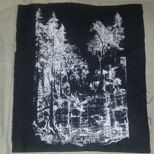 May include: Black and white patch featuring a design of a city skyline with trees in the foreground. The design is printed on a black fabric patch.
