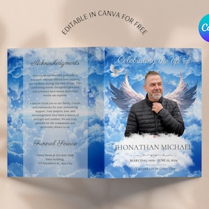 以下が含まれることがあります： 天使の羽根を持つ男性の写真が載った青と白の葬儀プログラム。プログラムには「Celebrating the life of Jhonathan Michael」というテキストと「March 01, 1970 - June 22, 2014」という日付が記載されています。