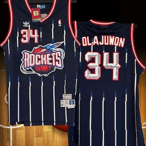Hakeem Olajuwon signed rockets jersey. NWT. Mitchell & Ness. Authenticated