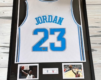 Michael Jordan signed autographed jersey. Holo Sticker. Framed. NWT. W/COA