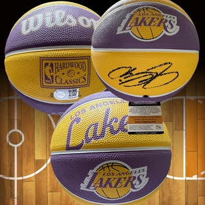 LeBron James signed autographed mini basketball. ProCert