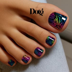 May include: Toenails decorated with a vibrant, multi-colored animal print pattern featuring neon shades of pink, purple, blue, green, and yellow against a black base. The design includes a mix of zebra stripes and leopard spots on each nail.