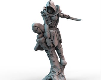 May include: A detailed figurine of a hooded figure, poised on a tree trunk, holding a dagger. The figure is wearing armor and boots, with a rope detail at the waist. The sculpture is a neutral gray color, suggesting a fantasy or role-playing theme.