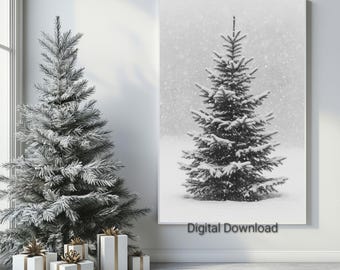 May include: Black and white image of a snow-covered Christmas tree in a snowy landscape. A framed print of a similar tree is on the wall. The words "Digital Download" are printed on the bottom of the framed print. White gift boxes with gold ribbons are in front of the tree.