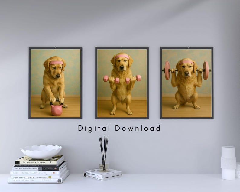 May include: Three framed prints showing a golden retriever wearing a pink headband and lifting weights. The dog is depicted with a kettlebell, dumbbells, and a barbell. The text "Digital Download" is printed below the frames.