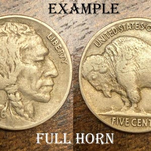 May include: Two vintage Buffalo nickels. One side features a Native American profile and the year 1926. The other side shows a bison and the words "Five Cents". The coins are silver in color.