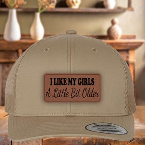 Funny 'I Like My Girls A Little Bit Older' Trucker Hat: Leather Patch Concert Cap