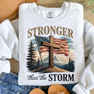 Christian Mens Shirt PNG Stronger than the Storm Patriotic Designs for Men Christian PNG Designs Trendy Png American Flag Tshirt Sublimation