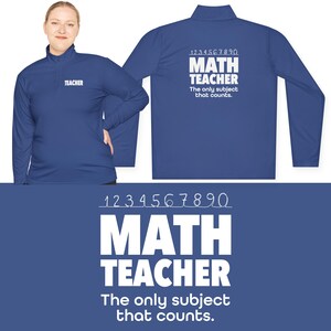 May include: A royal blue long-sleeve shirt with a white zipper and the text "1234567890 MATH TEACHER The only subject that counts." on the back.