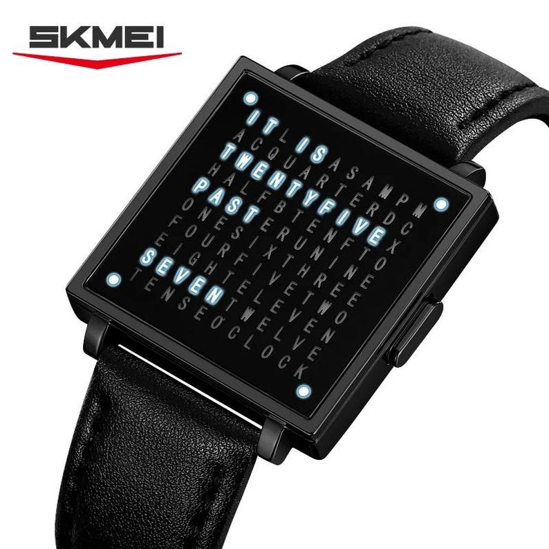 May include: Black SKMEI digital watch with a square face and a black leather band. The watch face displays the time using illuminated white words. The time shown is "Twenty Five Past Seven". The SKMEI logo is in the upper left corner.
