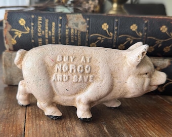ヴィンテージ鋳鉄製貯金箱：黒と白の金属製豚の貯金箱 - Etsy 日本