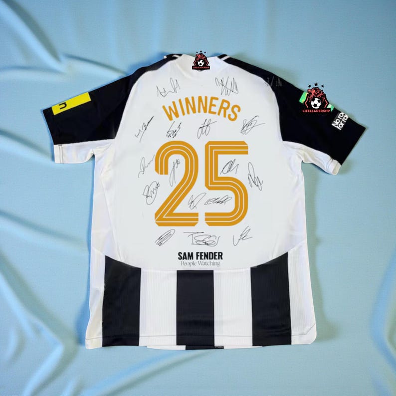 May include: White and black striped jersey with the number 25 in gold, the word "WINNERS" above, and signatures. The jersey also has the text "SAM FENDER People Watching". The sleeves are black with a yellow and black detail.