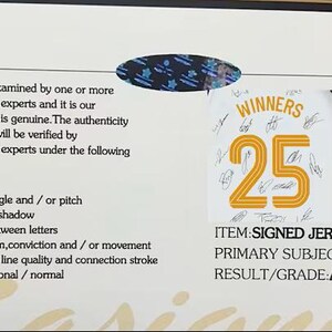 May include: A certificate of authenticity with text that reads "WINNERS 25" on a jersey. The item is a signed jersey, with the primary subject being "WINNERS 25". The result/grade is "AUTHENTIC".