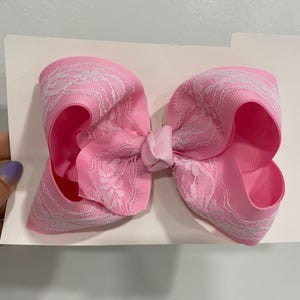 Pink boutique bow with lace overlay