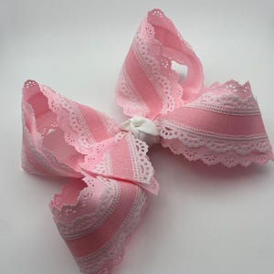 Girly lace scalloped pink bow, boutique bow