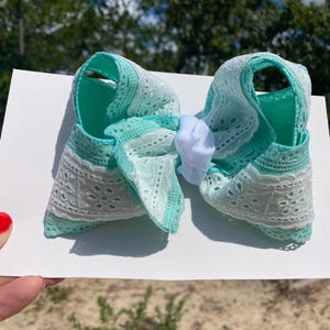 Mint scalloped trim bow with eyelet center