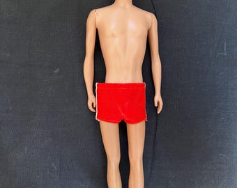 Ken Doll and clothes and accessories from the early  1960's.