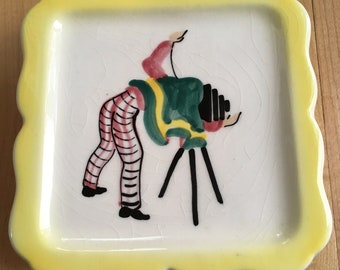 Decora Ceramic handpainted of a photographer wall piece