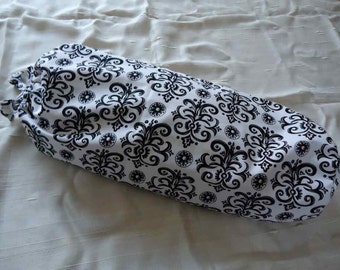 Neck/back roll with beautiful black and white removeable cover.