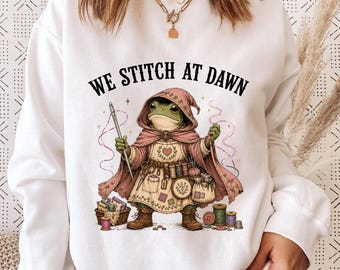 We Stitch At Dawn, Sewing Frog Shirt, Frog Seamstress Tee, Embroidery Frog Art, Cottagecore Sewing, Fantasy Sewing Shirt, Frog Tailor Wizard