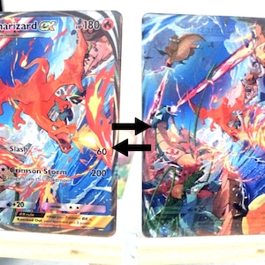 May include: Two Charizard EX Pok&eacute;mon trading cards. The first card features a red Charizard with flames, the text "Slash" and "Crimson Storm", and the number 60. The second card shows a battle scene with Charizard and other characters.