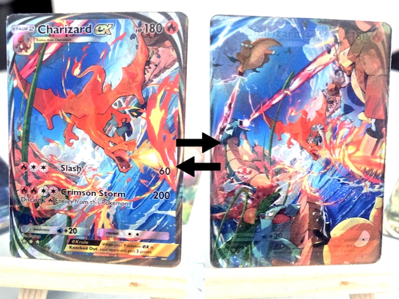 May include: Two Charizard EX Pok&eacute;mon trading cards. The first card features a red Charizard with flames, the text "Slash" and "Crimson Storm", and the number 60. The second card shows a battle scene with Charizard and other characters.