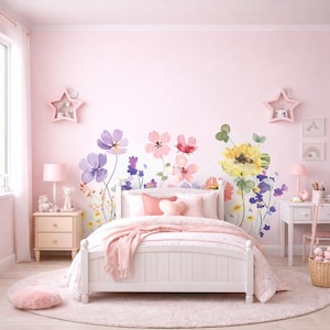 Pegatinas decorativas de pared con diseño floral en acuarela, grandes y en tonos pastel, ideales para la habitación del bebé.