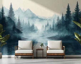 May include: A watercolour painting of a misty forest scene with a lake in the foreground. The painting features a blue and green colour palette and depicts a serene and tranquil landscape.