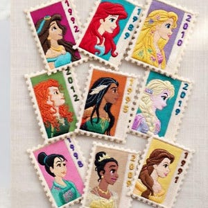 May include: A set of three ceramic mugs with a speckled, matte finish. The mugs are in shades of cream, light gray, and dark gray. Each mug has a simple, minimalist design and a rounded handle.