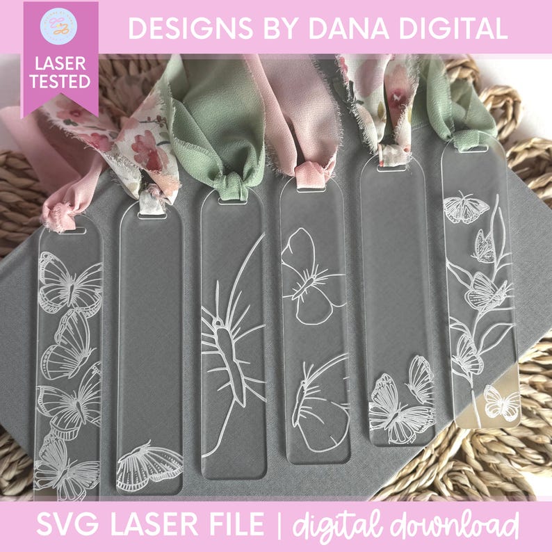 Clear acrylic bookmarks with etched butterfly designs and colorful ribbon accents. The bookmarks are rectangular with rounded tops and feature various butterfly illustrations. The text "DESIGNS BY DANA DIGITAL" and "SVG LASER FILE | digital download" are visible.
Butterfly Bookmark SVG File Digital Download Bridesmaid Gift Idea Mothers Day Present For Grandma Design Pattern Acrylic Laser Cutting File Glowforge XTool Compatible Nature Inspired Elegant Handmade Craft Project Ready To