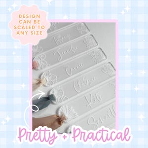 Clear acrylic name tags with floral designs and names like Tiffany, Jennifer, and Carrie. The tags are rectangular with rounded corners and are adorned with delicate floral patterns. The text "DESIGN CAN BE SCALED TO ANY SIZE" and "PRETTY + PRACTICAL" are also visible.
Laser Cut Bookmark Svg File Birth Flower Design Digital Download Custom Acrylic Bookmark Template Personalized Gift For Mothers Day Present Mom Birthday Gift Bridesmaid Keepsake Gift Grandma Floral Svg Design Laser File Glowforge