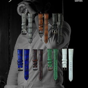 May include: A collection of watch straps in various colors, including blue, brown, green, and white. The straps have a textured, crocodile-like pattern and are displayed against a blurred background. The text "The Gentle Series" is visible.