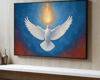 May include: A framed painting depicts a white dove with outstretched wings against a blue and orange background. Above the dove is a golden flame with radiating light. The artwork is displayed on a white shelf.