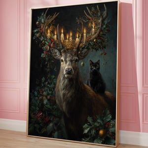 May include: A framed art print featuring a regal deer adorned with a crown and lit candles on its antlers. A black cat sits on the deer's back. The artwork is surrounded by festive greenery and berries, creating a holiday theme.