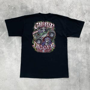 Vintage 2005 Grave Digger Race Team grafisch T-shirt zwart maat L afbeelding 1