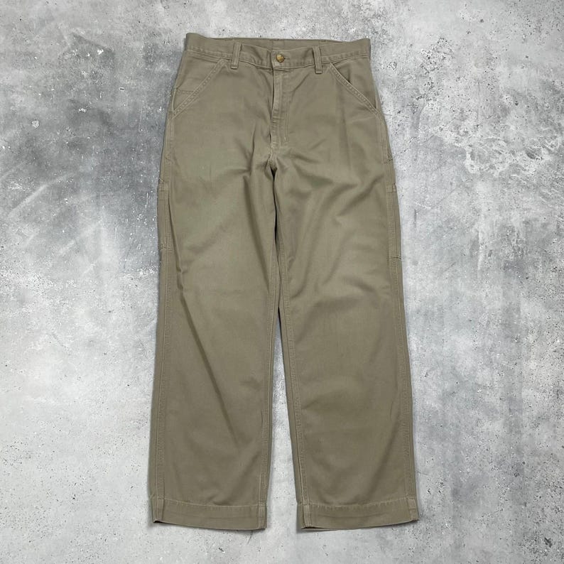 May include: A rustic wooden sign with the text "Welcome to our home" in a handwritten style. The sign is rectangular, with a distressed finish, and features a simple, inviting design. It's suitable for indoor or outdoor use.