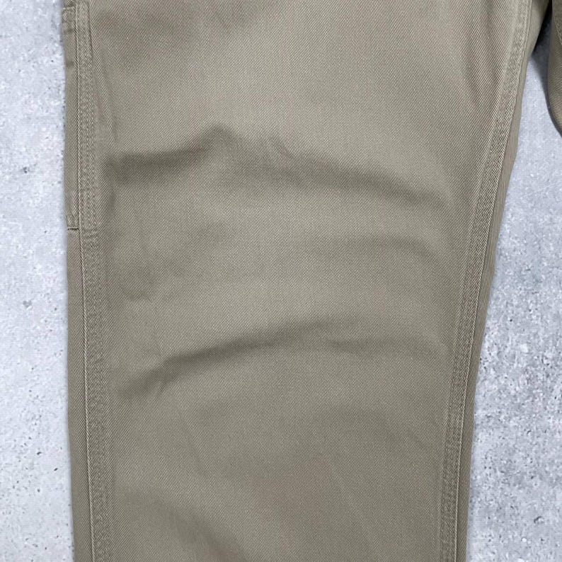 May include: A set of three ceramic mugs with a speckled, matte finish. Each mug features a different color: light blue, cream, and gray. The mugs have a simple, modern design and a comfortable handle.