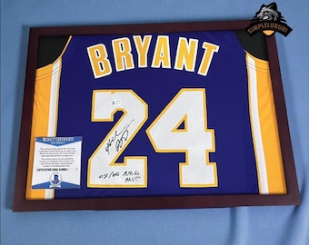 Signed & Framed Bryant #24 Purple Jersey with Beckett COA
