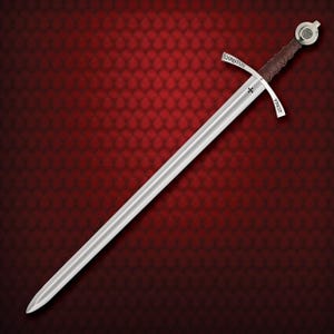 May include: A long, silver sword with a cross-shaped hilt. The hilt is inscribed with the words "Christus Vincit" and features a brown leather-wrapped grip. The sword has a pointed tip and a circular pommel.