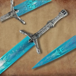 May include: Ornate fantasy swords with silver handles and bright blue blades. The blades feature intricate etched designs. The swords are displayed against a brown background.