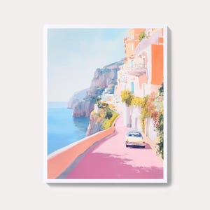 May include: A coastal landscape painting featuring a pink road winding along the sea. Buildings with orange and white facades line the road, with a vintage car driving towards the viewer. The sky is a soft blue.