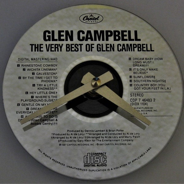 Glen Campbell music clock. Recycled CD clock. Grammy winning musician. Country music clock. Small clock for shelf or wall.