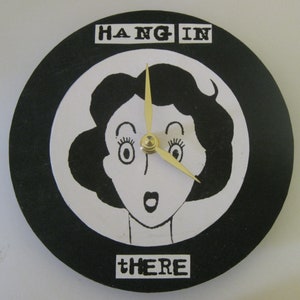 Small clock with a message. OOAK. Hang in there. 1950s clock.  Recycled records.  7 inch clock. Unique modern clock.