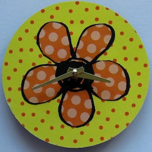 Funky flower clock. 7 in kitchen clock. Modern clock. Art clock.  Recycled record.