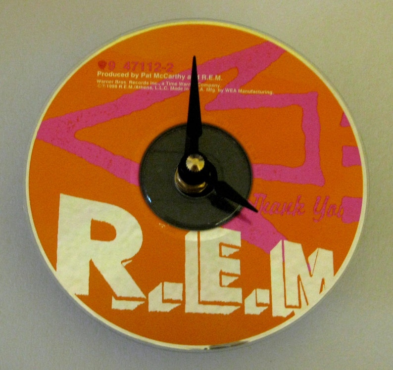 CD clock. R.E.M. clock. R.E.M. REM. Recycled CD. Alt rock cloc CD clock. R.E.M. clock. R.E.M. REM. Recycled CD. Alt rock cloc
