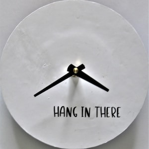 Small wall clock. Clock with a message. Hang in there. Recycled record. 7 inch clock. Modern minimalist clock. Art clock.