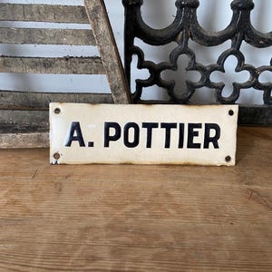 Antique French ‘A. Pottier’ enamel name plaque